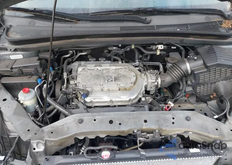 2009 Honda Odyssey Touring z USA, uszkodzony, nr VIN 5FNRL389X9B039650